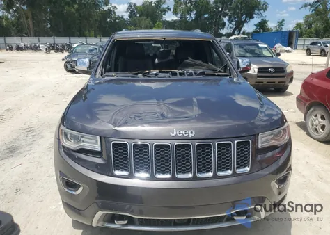 2015 Jeep Grand Cherokee Overland z USA, uszkodzony, nr VIN 1C4RJFCG2FC891660